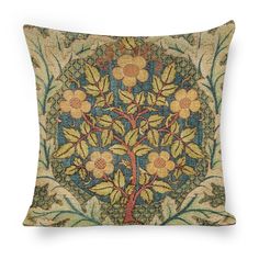 a decorative pillow with an embroidered tree on the front and sides, featuring leaves and flowers