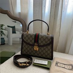 100% Authentic 100% Never Used. Open To Reasonable Offers. No Trades. No Visible Signs Of Scratching. Purchased In Cesar’s Palace Las Vegas. Will Ship In Dust Bag And Box Gucci Designer Handheld Shoulder Bag, Designer Gucci Handheld Shoulder Bag, Small Top Handle Bag, Gucci Ophidia, Bags Gucci, Gucci Bags, Handle Bag, Leather Tote Bag, Small Tops