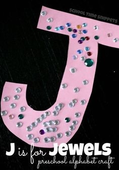 the letter j is for jewels preschool alphabet craft with sequins and beads on it