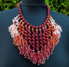 A handmade Toho seed bead necklace designed and handmade by me. An interesting necklace  made of brown, orange and white  beads and crystals. One of a kind statement necklace. A luxurious gift for you or your loved ones. Made with traditional seed bead techniques. This necklace radiates a lot of warmth and mood. Unique Handmade Coral Beaded Necklace, Unique Coral Beaded Necklaces, Unique Coral Beaded Necklaces With Round Beads, Unique Handmade Brown Crystal Necklace, Unique Handmade Coral Necklace, Unique Coral Beaded Necklace With Round Beads, Orange Beaded Necklaces With Dangling Beads For Gift, Handmade Coral Beaded Bohemian Necklace, Handmade Coral Bohemian Beaded Necklaces