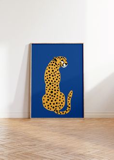 a blue poster with a yellow and black cheetah sitting on it's side