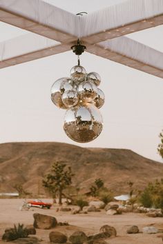 vintage wedding aesthetic film photography boho vibes disco ball desert wedding inspo joshua tree classic car wedding photography ideas Boho Desert Decor, Aesthetic Film Photography, Palm Springs Bach, Vintage Wedding Aesthetic, Classic Car Wedding, Desert Party, Desert Festival, Disco Decorations