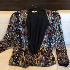 Vintage Sequin Jacket Gold Pink Purple Blue And Black. Triangles And Diamond Patterns Vintage Sequin Jacket, Sequin Jacket, Diamond Pattern, Blazer Suit, Pink Purple, Blue And Purple, Suit Jacket, Jackets & Coats, Jackets For Women