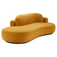 a yellow couch sitting on top of a white floor