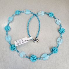 Looking for something in a light blue? A piece of jewelry that is easy to wear because it is lightweight or because you won't have to fiddle with getting the clasp open to put the ring into the clasp?  This baby blue beaded necklace has a magnetic clasp that makes putting it on simply a breeze. This baby blue beaded necklace has a magnetic clasp that makes putting it on simply a breeze. Detailed plastic flowers add beauty while making the necklace weigh less. Enjoy a wash of blue watery look fro Blue Flower Necklace, Pastel Outfits, Blue Beaded Necklace, Pastel Outfit, Oval Beads, Plastic Flowers, Magnetic Clasp, Blue Flower, Flower Necklace