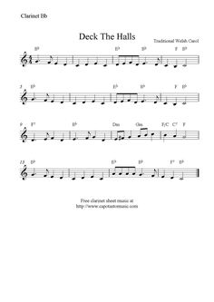 sheet music with the words deck the hall written in black and white, on top of it