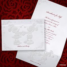 two wedding cards with mickey and minnie mouses on them, one in red and the other in white