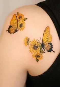 sunflowers and butterflies on the back of a woman's shoulder