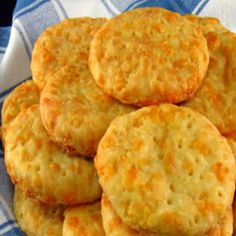 a pile of biscuits sitting on top of a blue and white towel