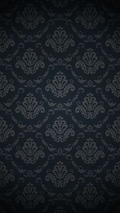 a black and white wallpaper with an ornate design on it's side,