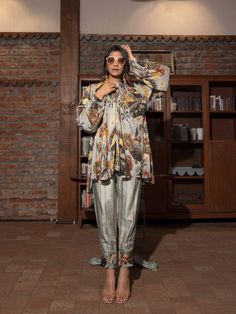 POPULAR INDIAN WEAR WEBSITES IN USA- Ash grey embellished printed viscose co-ord set with gathered shirt and cuff pants. Shop online kids Indian clothes, designer bridesmaids collection, exclusive custom designs, plus size clothing, Asian Bridal, ethnic clutch bags, womens low heels shoes from Trendroots. Free Shipping Cuff Pants, Printed Embroidery, Mandarin Collar Shirt, Print Pant, Shirt Pant Set, Ethnic Print, Cuffed Pants, Grey Prints, Co Ord Set