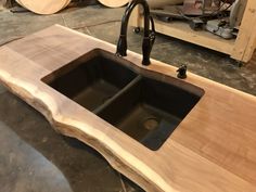 a sink made out of wood in a workshop