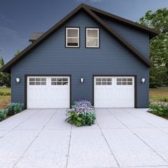 a blue house with two garages and flowers in the front yard