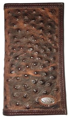 a brown leather wallet with holes on it