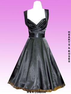 H London Black Satin 50's Dress Retro Black Cocktail Dress, Black Retro Party Dress, Retro Black Party Dress, Black Fitted Dress For Retro-themed Events, Fitted Vintage Dress For Retro-themed Events, Fitted Black Dresses For Retro-themed Events, Vintage Style Black Party Dress, Black Retro Style Dress For Retro-themed Events, Black Fitted Sleeveless Vintage Dress