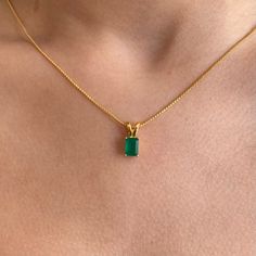 Our gorgeous Green Onyx rectangular pendant necklace with 18K gold plated plated on sterling silver chain is the perfect addition to your jewellery collection. Pair this premium, yet affordable green gemstone necklace with your everyday outfits to add a touch of style and luxury to your look. LOOK AND FEEL Carigari is committed to providing you with the same premium feeling of some of the biggest names in the industry for an affordable price tag. All our product pictures are unedited and unfiltered, shot under natural light with an iPhone 11. What you see is what you get! MEASUREMENTS Chain length: 15inches Gemstone size: 12mm by 8mm MATERIALS A responsibly sourced green Onyx is paired with an 18k gold vermeil chain to create a minimal, yet gorgeous design with a premium feel. Note: All ou Formal Emerald Necklace With Rectangular Pendant, Classic Green Necklace With Rectangular Pendant, Green Rectangular Pendant Jewelry For Everyday, Fine Jewelry Gold Emerald Rectangular Necklace, Gold Rectangular Emerald Necklace In Fine Jewelry Style, Gold Emerald Necklace In Fine Jewelry Style, Fine Jewelry Gold Emerald Necklace, Elegant Green Rectangular Emerald Necklace, Rectangular Yellow Gold Emerald Necklace Gift