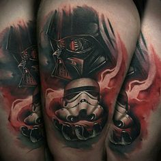 tattoos on the legs of people with star wars characters and helmets painted on their bodies