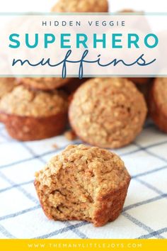 some muffins are sitting on a table with the words hidden veggie superhero muffins