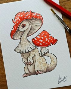 a drawing of a mushroom sitting on top of a table next to a red marker