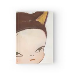 a book with an image of a cat's head on top of the cover