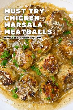 meatballs in gravy with parmesan cheese and parsley on top