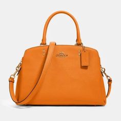 Coach Handbag Orange New Without Tags. The Crossgrain Leather Lillie Carryall Is A Structured Everyday Bag Featuring Top Handles And A Detachable Strap For Versatility. Style Number: 91493 Measurements: Length: 5.25" Height: 12.75" Width: 8.75" Materials: Crossgrain Leather Fabric Lining Handle: Handles With 4.75" Drop Strap: Detachable Strap With 20" Drop For Shoulder Or Crossbody Wear Features: Outside Open Pocket Inside Zip Pocket Snap Closure Center Zip Compartment Inside Multifunction Pocke Orange Top Handle Bag With Handle Drop, Elegant Orange Bag With Double Handle, Elegant Orange Double Handle Bag, Elegant Orange Satchel, Coach Orange Crossbody Bag, Coach Orange Satchel Bag, Classic Orange Satchel Bag, Coach Orange Bag With Detachable Strap, Classic Orange Bag With Detachable Strap