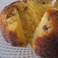 a close up of a muffin on a glass plate