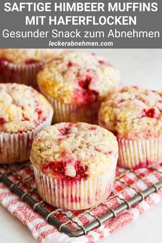 raspberry yogurt muffins are on a cooling rack and ready to be eaten