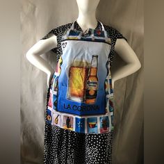 a mannequin wearing an apron with beer bottles on it's front and back