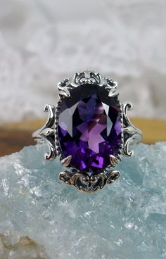 "Natural Purple Amethyst Ring Vampire Design#84 Custom Made Inspired by Gothic & Renaissance era jewelry, I now offer this lovely Antique styles ring in sterling silver. This gorgeous ring is set with a flawless natural 5ct purple amethyst gemstone. This stunning gemstone has excellent color and clarity. The oval full cut oval purple amethyst is 14mm (9/16th of an inch) Long by 10mm Wide (3/8th\"). The ring sits 8mm off the finger. The inside of the band is marked 925 for sterling. Notice th Gothic Filigree, Vampire Design, Vampire Ring, Antique Style Rings, Purple Amethyst Ring, Unusual Rings, Gothic Vintage, Nature Ring, Vintage Style Jewellery