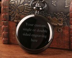 Personalized Pocket Watch for Groomsmen Gift, Engraved Pocket Watch for Groomsmen Gift, Personalized Pocket watch for Best Man Gift PRODUCT DETAILS Timeless, versatile and seriously stylish, this stainless steel pocket watch is guaranteed to be the perfect gift for a groom, father, husband and more. This precisely constructed timepiece for men features a stainless steel watch that's 1.9 inches in diameter. The white face with black hands and markers makes it easy to read. An elegant gift for a m Black Stainless Steel Chronometer Watch, Vintage Engraved Watch Accessories As Gift, Black Stainless Steel Watch Accessories For Gift, Black Watch With Metal Dial As Gift, Black Stainless Steel Watch Accessories As Gift, Engraved Stainless Steel Watch With Round Dial, Engraved Stainless Steel Watch, Vintage Black Pocket Watch Gift, Stainless Steel Engraved Watch With Round Dial