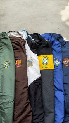 2000’s Football drop coming soon Follow @insydshouse on instagram for more info & updates Nylon Brazil, Barcelona, Argentina, Portugal Vintage Tracksuit, Autumn School Outfit, Football Pants, Men's Windbreaker, Retro Football, Football Outfits, Vintage Football, Fall Street Style