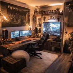 a home office with two monitors on the wall and a fur rug in front of it