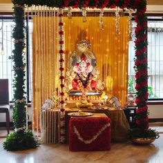 a decorated stage with flowers and decorations