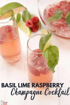 basil lime raspberry champagne cocktail in glasses with mint garnish on the rim