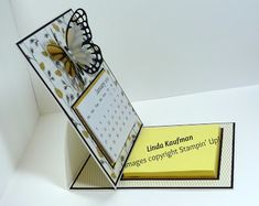 an open card with a butterfly on it