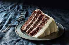 a piece of cake sitting on top of a plate next to a knife and fork