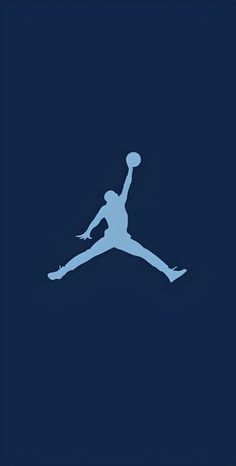 the air jordan logo is shown in blue and white on a dark background with an image of a basketball player jumping up into the air