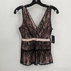 Brand: I N C Market: Women Color: Black Lace Over Soft Pink Lining Size: Small Petite Style: New With Tags Summer Dressy Lace Date Night Top Side Zip Closure Retail Price: $ 69.00 Fabric Content: 100% Nylon Fabric Care: Machine Wash Tumble Dry Measurements Laid Flat: Pit To Pit: 19 Inches Length: 25 Inches Condition: New With Tags No Flaws 5 Star Rated Seller Packaged With Care Fast Shipping Offers Welcome Bundle & Save Weight: 5.5 Oz B 45 2987 Elegant Pink Tank Top For Night Out, Pink Sleeveless Tank Top For Night Out, Pink Stretch Tank Top For Night Out, Pink Stretch Elegant Camisole, Elegant Stretch Pink Camisole, Elegant Pink Stretch Camisole, Pink Fitted Sleeveless Camisole, Pink Fitted Camisole, Feminine Pink Camisole For Night Out