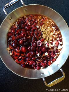 cranberry sauce and spices in a pan