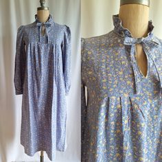 Rare original Laura Ashley maxi dress in a prairie style Cotton fabric with an almost flannel hand Periwinkle blue with a ditsy berry print Puffed long sleeves with a 1 1/2 inch cuff Ruffle collar and ties Pin tucks  Pockets at side seams  Label - laura ashley  Made in Carno Wales in the 70s when the prairie style was manufactured UK 12 - this is a vintage size, the garment measures more like a UK 8 possibly 10 as the back measurement is only 13" across  EUR 38 - again a vintage size, more like Laura Ashley Vintage Dress, Berry Print, Puffed Long Sleeves, Prairie Style, Periwinkle Blue, Ruffle Collar, Pin Tucks, Laura Ashley, Dress Clothes For Women