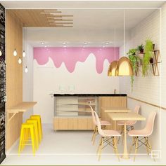 the interior of a modern kitchen with pink and yellow accents