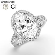 a diamond engagement ring with an oval center surrounded by round brilliant cut diamonds and pave set in 18k white gold