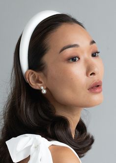 This is how Jennifer Behr does the classic padded headband, one of our best-selling silhouettes. This Tori Headband is crafted from silk, creating a rich luster. We take fit seriously, and our headbands are wear-tested to be comfortable all day. Dimensions: 1 inch width, 1 inch height. Overall 5.9 x 5.5 inches Rosette Headband, Thick Headbands, Luxury Hair Accessories, Wedding Hair Headband, Bride Headband, Jennifer Behr, Silk Headband, Padded Headband, White Headband