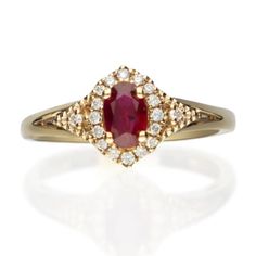 Stunning, timeless and classy eternity Unique ring. Decorate yourself in luxury with this Gin & Grace ring. The 10k Yellow Gold jewelry boasts 4X6 Oval-Cut Prong Setting Genuine Ruby (1pcs) 0.53 Carat and Round-Cut Prong Setting Diamond (18pcs) 0.13 Carat accent stones for a lovely design. This ring is weight 2.26 grams. Crafted with 10k Yellow Gold, this delicate Ring is polished to a high finish shine. Fine Jewelry Yellow Gold Ruby Ring With Halo Design, Yellow Gold Ruby Rings With Halo Design, Classic Ruby Ring With Halo Design, Elegant Marquise Ruby Ring With Diamond Cut, Heirloom Ruby Ring In Yellow Gold With Halo Design, Heirloom Yellow Gold Ruby Ring With Halo Design, Elegant Ruby Wedding Ring With Halo, Classic Red Cluster Ring, Classic 14k Gold Ruby Ring With Halo Design