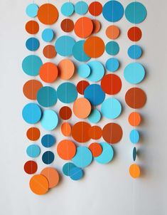 an image of colorful circles hanging on the wall