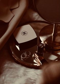 an assortment of jewelry sitting on top of a table