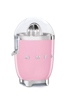 an image of a pink mixer with the word smeg on it