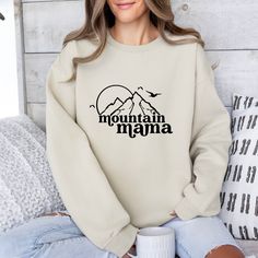 Mountain Mama Shirt, Camping T Shirt, Camper Mom Sweater, Mountains Tee, Adventure Hoodie, Hiking Tee 𝗛𝗢𝗪 𝗧𝗢 𝗢𝗥𝗗𝗘𝗥? 𝟏. Select the shirt 𝗦𝘁𝘆𝗹𝗲 2. Select the 𝗦𝗶𝘇𝗲 3. Select the shirt color 4. Select the quantity, 5. Click 𝗔𝗗𝗗 𝗧𝗢 𝗖𝗔𝗥𝗧.  If you want to buy more than one, please go back to the listing and repeat the steps. We choose Gildan Soft Style (100% Cotton), Bella Canvas (100% Cotton), Sweatshirts and Hoodies Gildan (50% Cotton-50% Polyester). Please let us know if Mountain Mama Shirt, Casual Sweatshirt With Letter Print For Outdoor Activities, Casual Sweatshirt With Letter Print For Outdoor, Casual Letter Print Sweatshirt For Outdoor Activities, Casual Hooded Tops For Hiking, Casual Hiking Sweatshirt With Letter Print, Casual Letter Print Sweatshirt For Hiking, Casual Crew Neck Hiking Hoodie, Casual Crew Neck Hoodie For Hiking