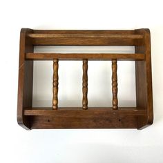 an old wooden shelf with some sort of railing